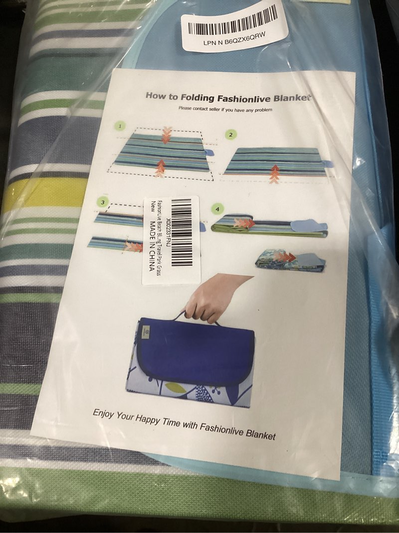 Condition photo showing New/Like New for beach blanket extra large picnic blankets sandproof waterproof outdoor indoor blanket lightweight handy mat portable beach mat for camping hiking travel park grass blue line