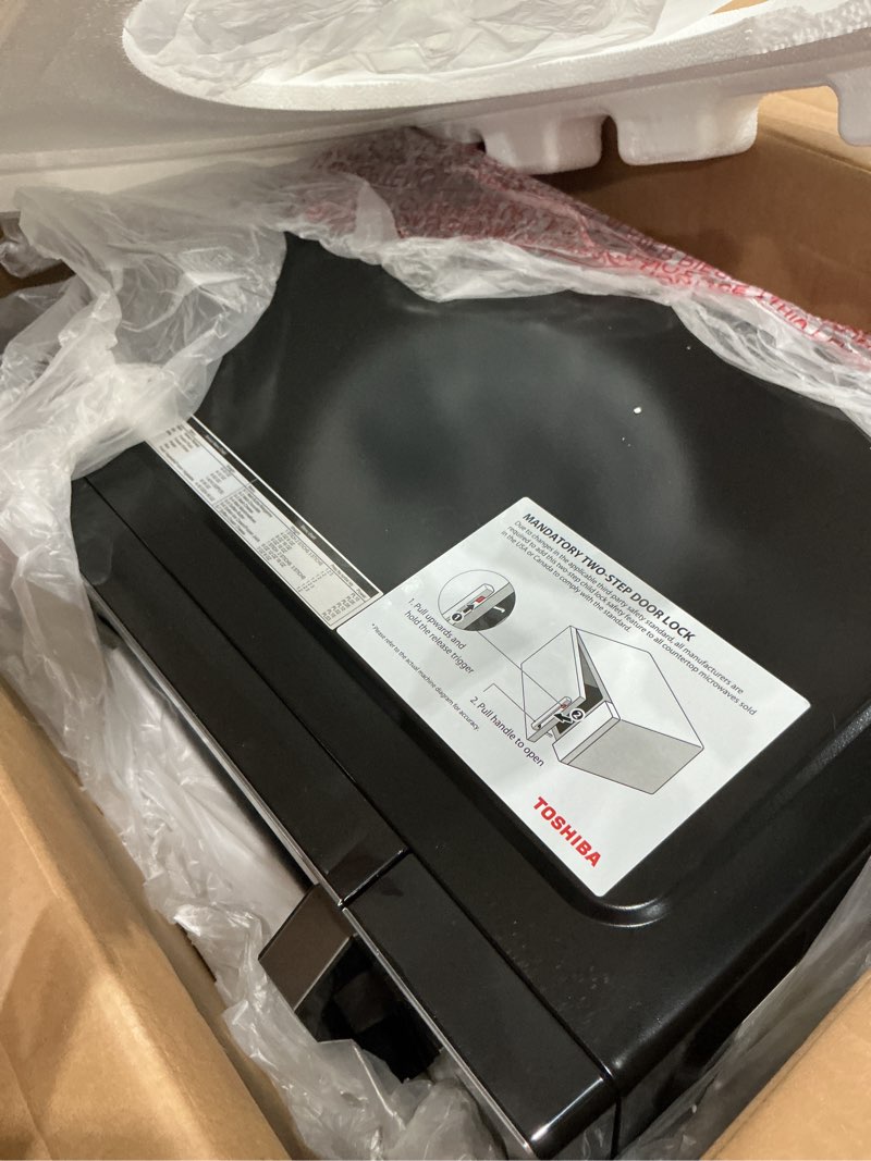 Condition photo showing Good Condition for toshiba em131a5c-bs countertop microwave ovens 1.2 cu ft, 12.4" removable turntable smart humidity sensor 12 auto menus mute function eco mode easy clean interior black color 1000w 1.2 cu.ft