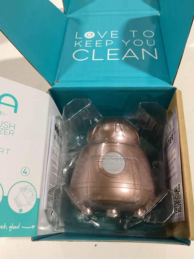 Condition photo showing item condition for tao clean ona diamond orbital facial brush and cleansing station, electric face cleansing brush with ergonomic handle, dual speed settings, rose gold