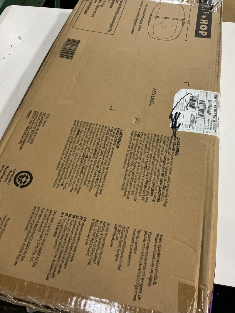 Condition photo showing Good Condition for Skip Hop Baby Changing Pad Nursery Style Wipe-Clean Contoured with Cushioned Foam, Non-Skid Base, Built-in Safety Belt & Tuck-Away Toy Bar Fits Standard Changing Tables, Oat 16" Oat