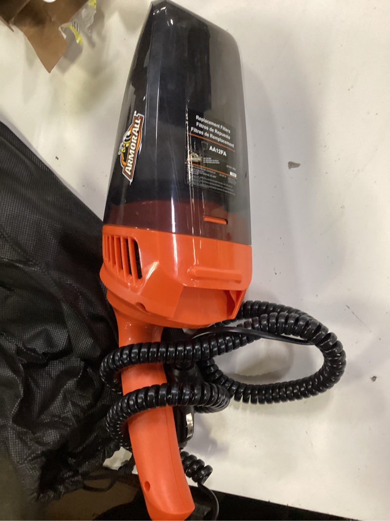 Condition photo showing As Is for armor all 12v handheld car vacuum,aa12v1 0902