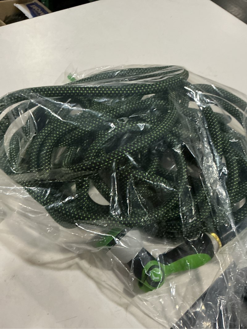 Condition photo showing As Is for garden hose 50ft - lightweight water hose, with 10-pattern nozzle, triple-layer construction, all-weather hose,flexible and anti-kink, durable for watering, outdoor use 50ft green