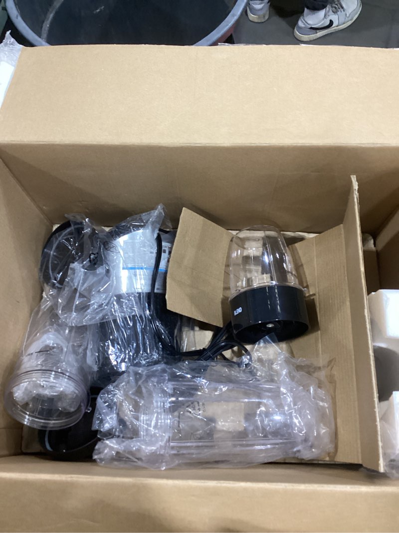 Condition photo showing As Is for Ninja BN801 Professional Plus Kitchen System, 1400 WP, 5 Functions for Smoothies, Chopping, Dough & More with Auto IQ, 72-oz.* Blender Pitcher, 64-oz. Processor Bowl, (2) 24-oz. To-Go Cups, Grey 64 oz. Blender + Kitchen System