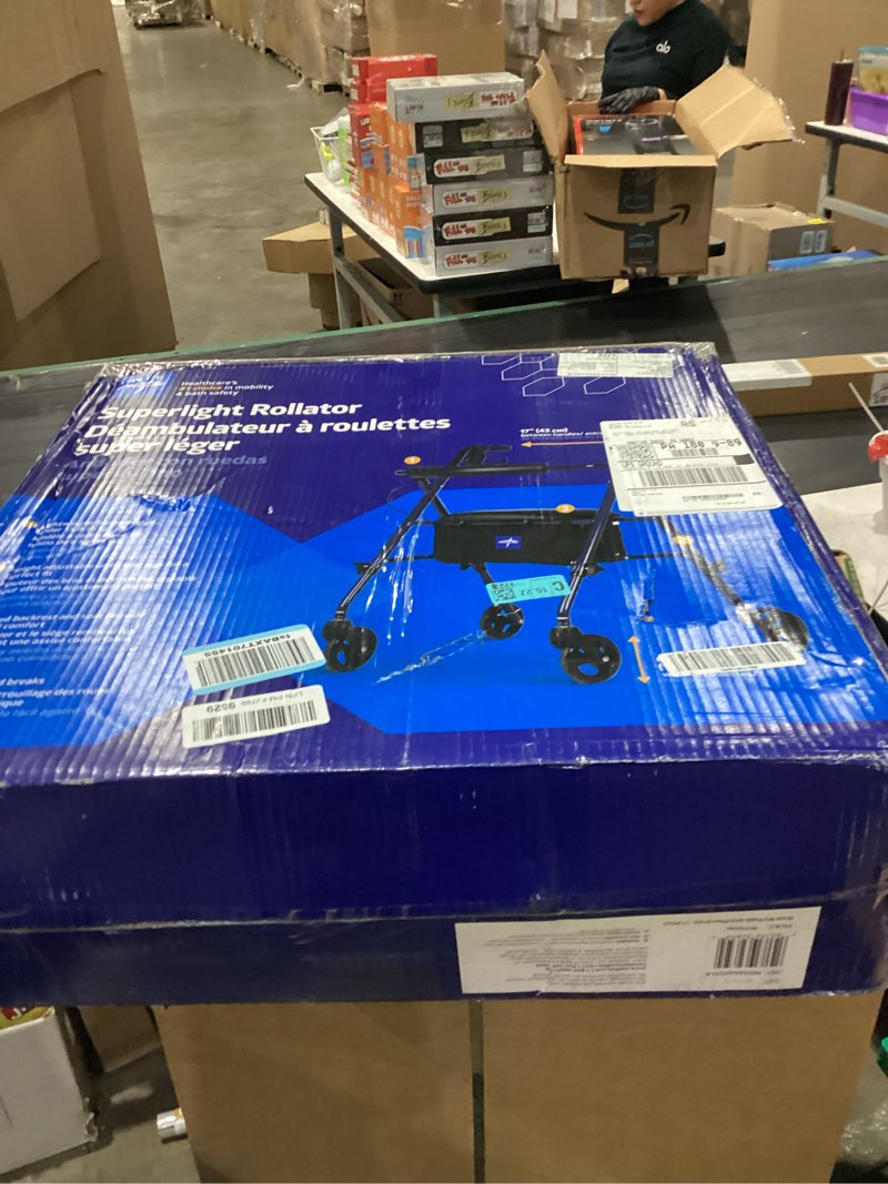 Condition photo showing item condition for Medline Superlight Folding Aluminum Mobility Rollator Walker, Smoky Blue, 250 lb. Weight Capacity, 6" Wheels, Adjustable Arms and Seat, Foldable Rolling Walker for Seniors Smokey Blue