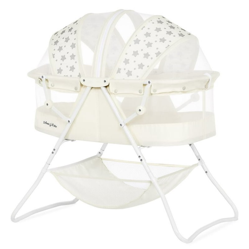 dream on me karley bassinet in french white, quick fold and easy to carry, large storage basket