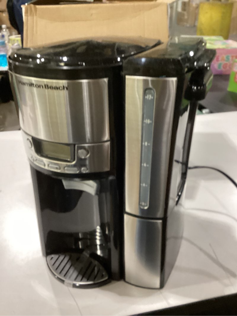 Condition photo showing Good Condition for hamilton beach one press programmable dispensing 12 cup coffee maker with internal coffee pot, stays warm and fresh for hours, 60 oz. removable reservoir, black & stainless steel (47950) black and silver