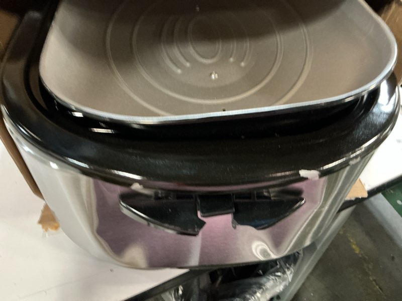 Condition photo showing As Is for Sunvivi 24lb 20-Quart Roaster Oven, Electric Roaster Oven with Self-Basting Lid, Turkey Roaster with Unique Defrost/Warm Function, Large Roaster with Removable Pan & Rack, Stainless Steel, Silver