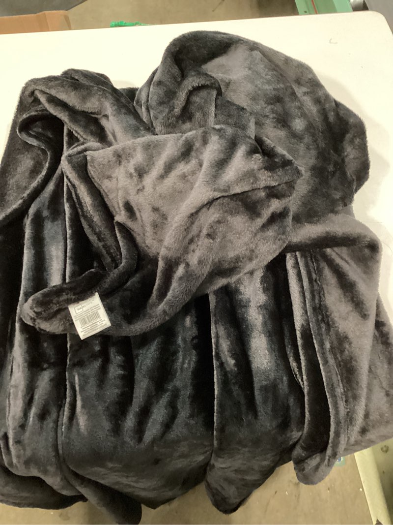 Condition photo showing As Is for mainstays blanket black 66in x90in fleece blanket