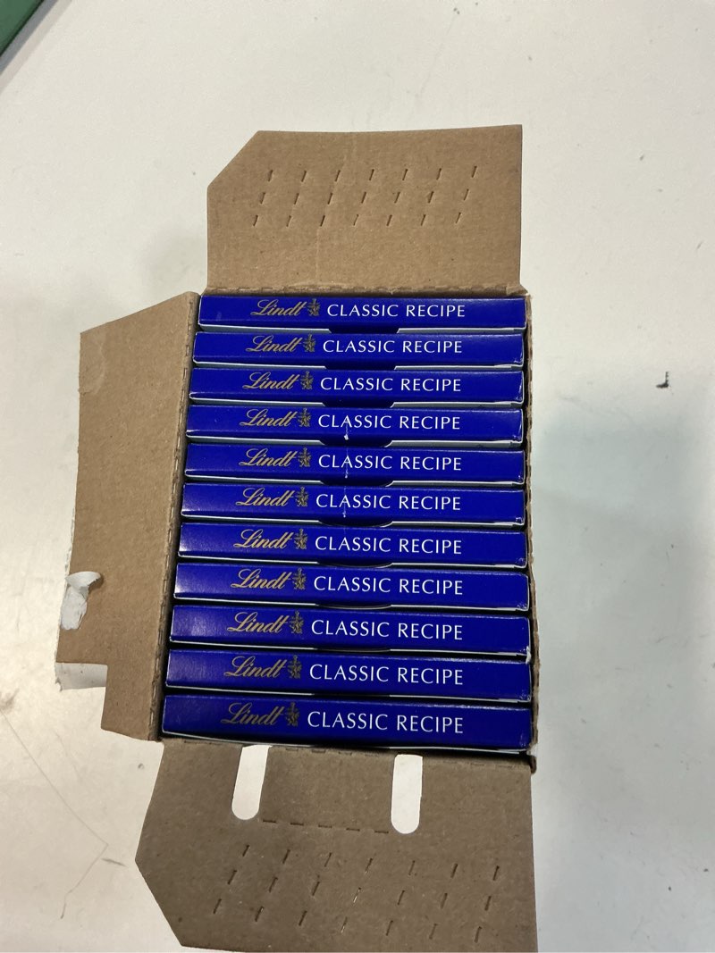 Condition photo showing New/Like New for lindt classic recipe crispy milk chocolate candy bar, milk chocolate, 12 pack, 4.4 oz. crispy milk chocolate 4.4 ounce (pack of 12)