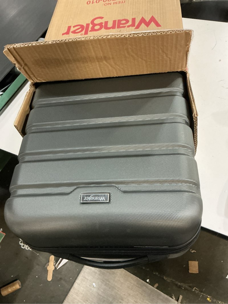 Condition photo showing Good Condition for Wrangler 22" Hardside Spinner Carry-On Luggage, Charcoal
