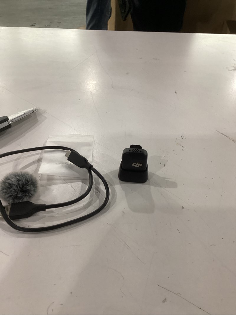 Condition photo showing As Is for DJI Mic Mini Transmitter (Infinity Black), Ultralight, Wireless Lavalier Microphone for DJI Action 5 Pro/Osmo Pocket 3, Noise Cancelling, Wireless Microphone for Camera/iPhone/Android, Vlog, Streaming