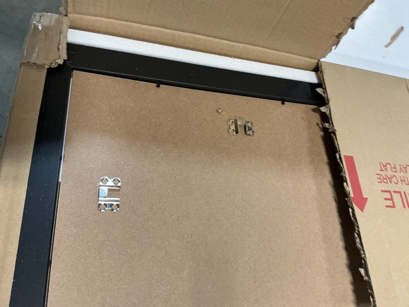 Condition photo showing Good Condition for LaVie Home 24x36 Picture Frame Black Poster Frame,Display Pictures 20x30 with Mat or 24x36 Without Mat, Stable and Sturdy Frame and Polished Plexiglass, Horizontal and Vertical Format of The Walls 24x36 Black