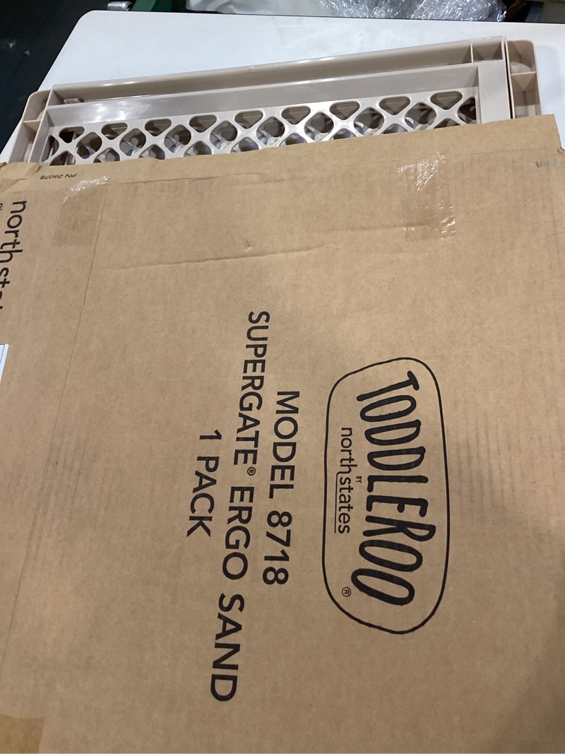 Condition photo showing New/Like New for toddleroo by north states - supergate ergo baby gate: plastic baby gate for stairs & doorways - adjustable indoor safety gate - made in usa - 26 to 42 inches wide - 26 inches tall - sand