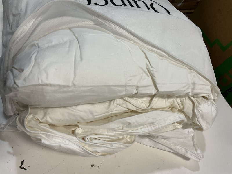Condition photo showing As Is for quince lightweight premium down alternative comforter, king/cal king, white