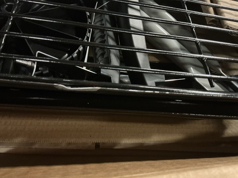 Condition photo showing As Is for expert grill 17.5 inch charcoal grill with wheels and adjustable dampers