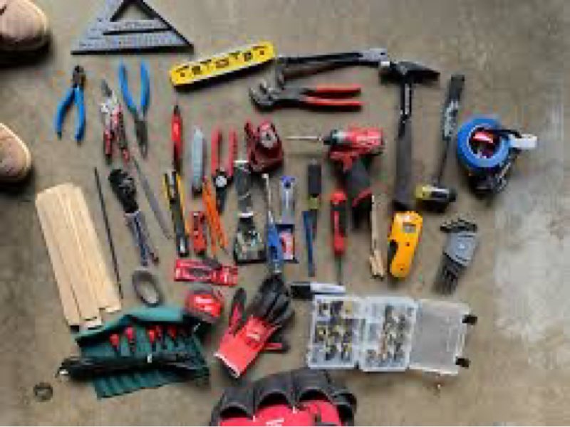 Mixture of small miscellanenus loose tools screws laches home repair accesories