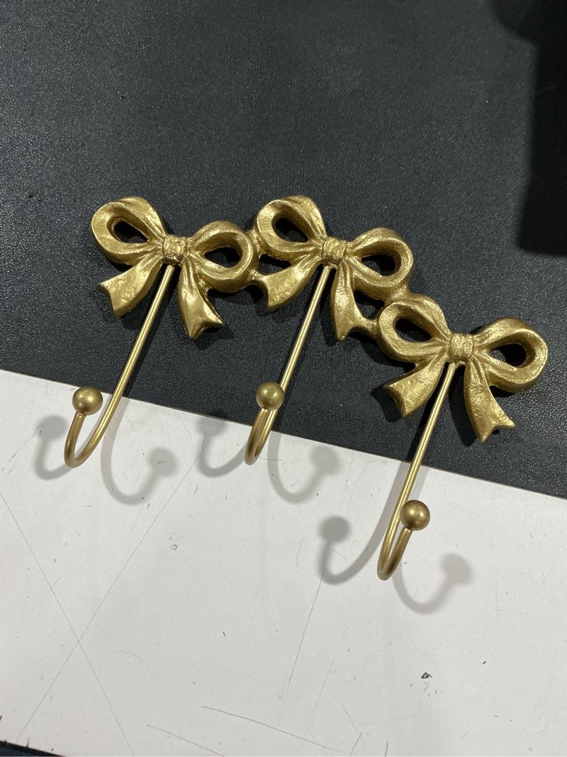 Condition photo showing Good Condition for small bow wall hook,gold wall mounted functional hooks,antique gold cast iron hook for coats,bags, bath towels,room decorations,girls room,bathroom,office(three-bows hooks:8.27x5.59 inches) triple bow hooks(8.27x5.59 inches)