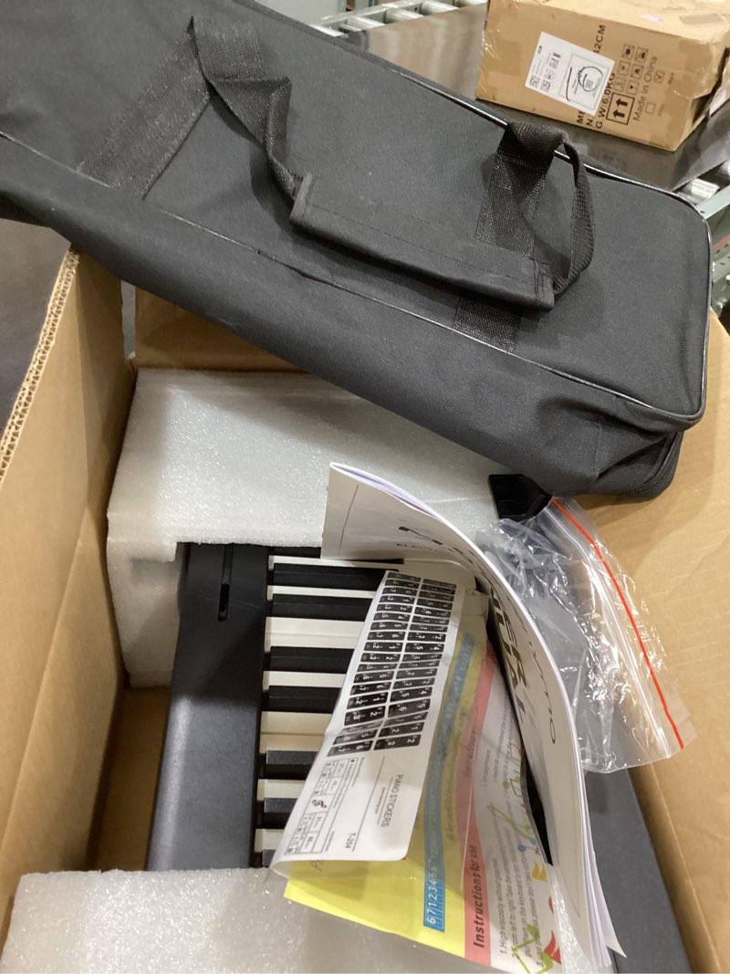 Condition photo showing As Is for Rhymo Folding Piano Keyboard, 61 Keys Sensitive Electric Piano, Weighted Portable Electric Keyboards with Bluetooth MIDI, Digital Foldable Keyboard for Beginner