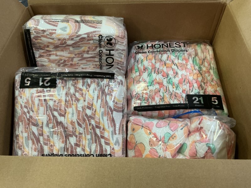 Condition photo showing As Is for The Honest Company Comfort Dry Disposable Diapers for Sensitive Skin, Hypoallergenic, Wingin' It + Catching Rainbows, Super Club Box Size 5 (27 lbs) 84 Count Size 5 (84 Count) Wingin' It + Catching Rainbows
