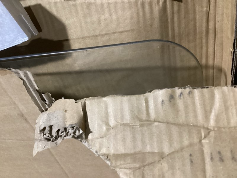 Condition photo showing As Is for lorell tempered glass chairmat, 44" width x 50" depth x 0.25" thickness, clear, 1 each rectangular 44" x 50"