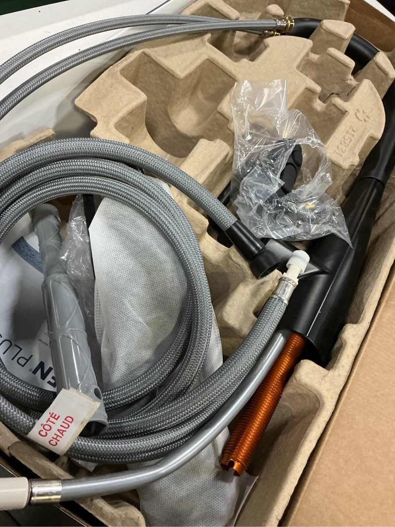 Condition photo showing As Is for moen maureen matte black single handle pull-down kitchen faucet with sprayer (deck plate included)