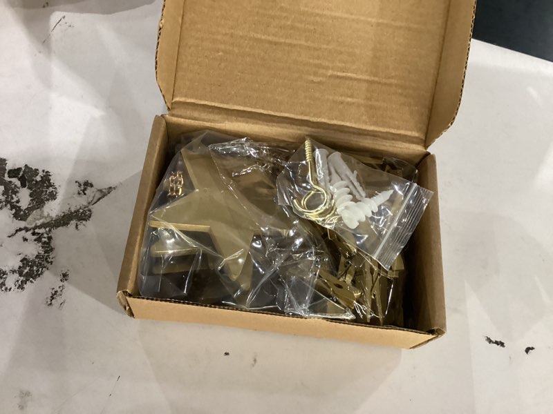Condition photo showing New/Like New for mkono hanging photo display boho decor wooden stars garland with metal chains, pictures cards holder with 25 wood clips, wall art for christmas living room bedroom dorm decor, teen girls gift, gold gold large