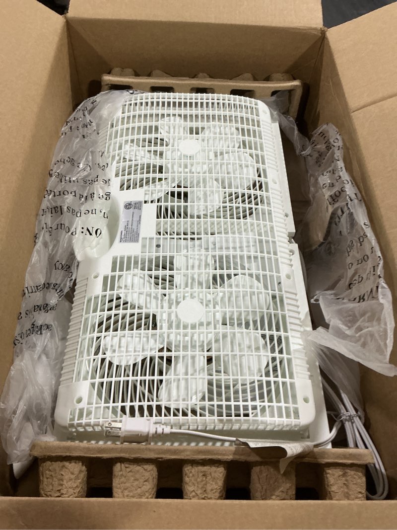 Condition photo showing As Is for amazon basics window fans for home bedroom, twin heads, cooling airflow, exhaust, expandable side panel manual control, 3 speeds, 63w, 9 inch, white