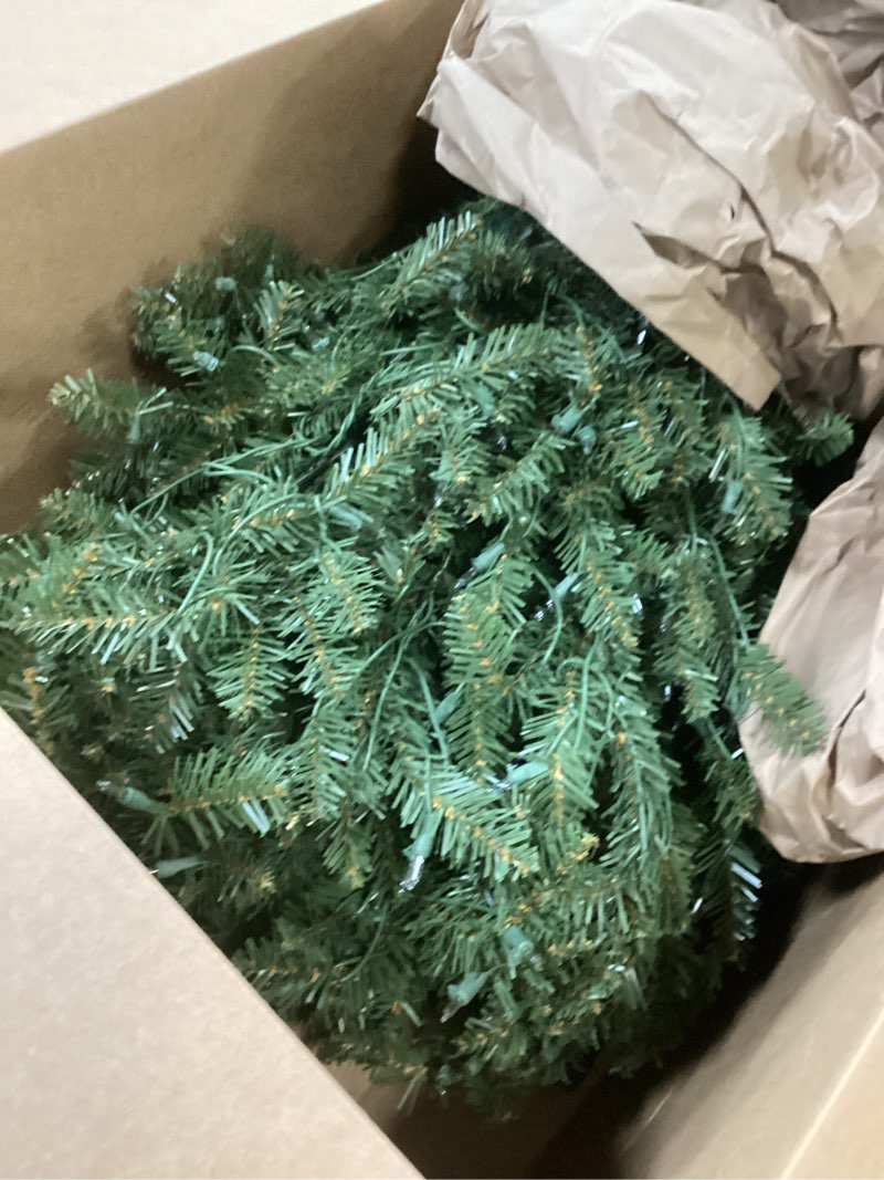 Condition photo showing As Is for Puleo International 7.5ft Pre-Lit Slim Fraser Christmas Tree with 500 Clear Lights, 1453 Realistic Dense Branch Tips, Easy Setup Artificial Trees with Sturdy Metal Stand 7.5' Slim Fraser Fir with 500 Clear Lights