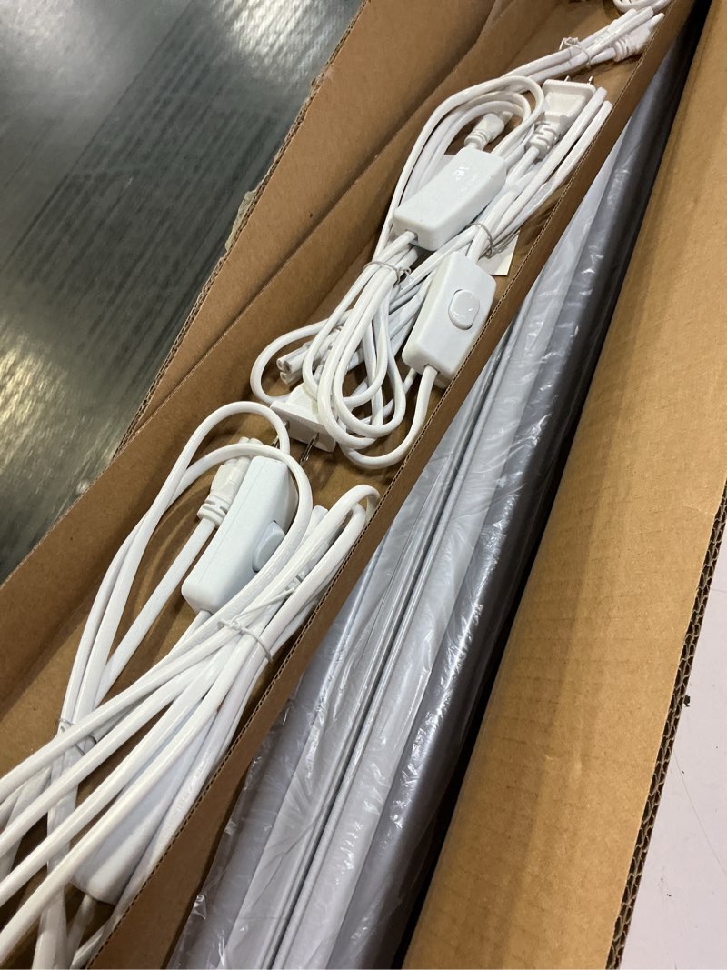 Condition photo showing Good Condition for pak 4ft led shop lights, 2300lm 6500k cool white, 20w energy efficient linkable ceiling and under cabinet lighting, t5 integrated utility fixture for garage, workshop, basement, fcc certified, 4 pack white 4ft 6500k-4 pack