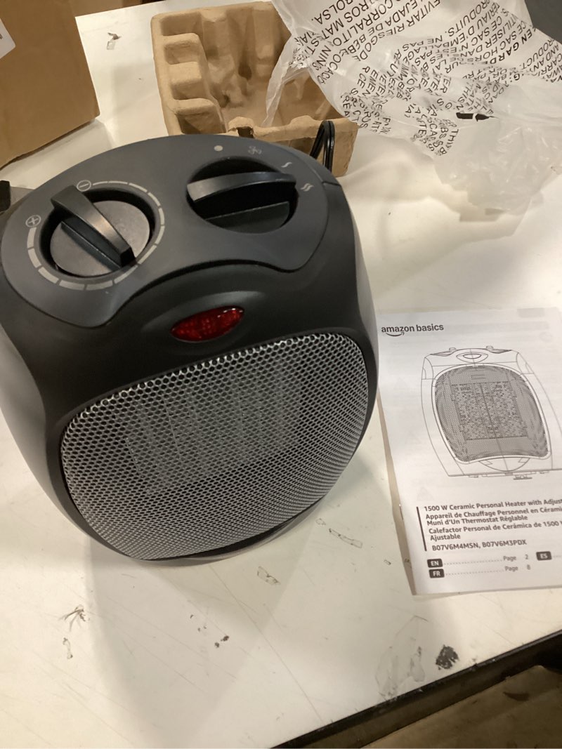 Condition photo showing Good Condition for Amazon Basics Ceramic Space Heater, Portable Indoor Heating Solution, With Overheat and Tip-Over Protection, Thermostat, Non-Oscillating, 1500W, 7.52"D x 6.34"W x 9.45"H, Black Non-oscillating black