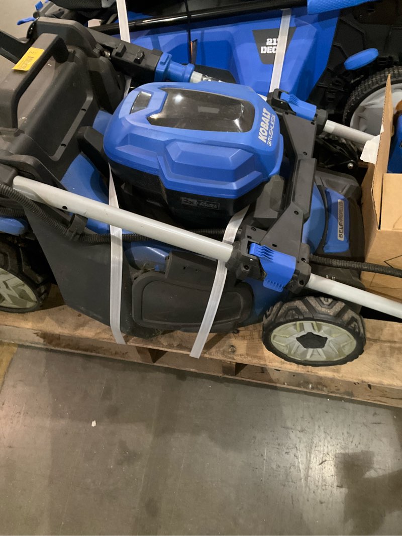 Condition photo showing As Is for 20” self propelled lawn mower