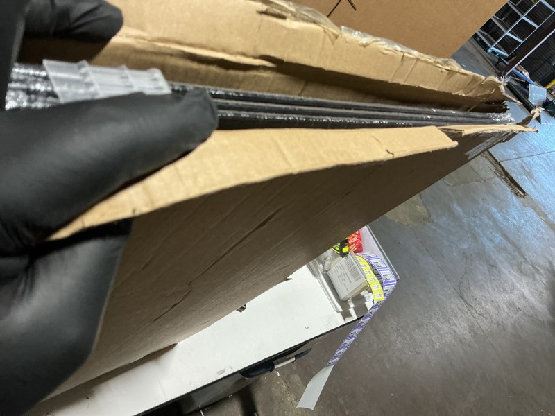 Condition photo showing As Is for upsimples 24x36 Poster Frame Black 3 Pack, Scratch-Proof Picture Frames 24 x 36 for Photo Gallery - Slide-In Strips, Horizontal or Vertical Wall Mounting Black 24x36