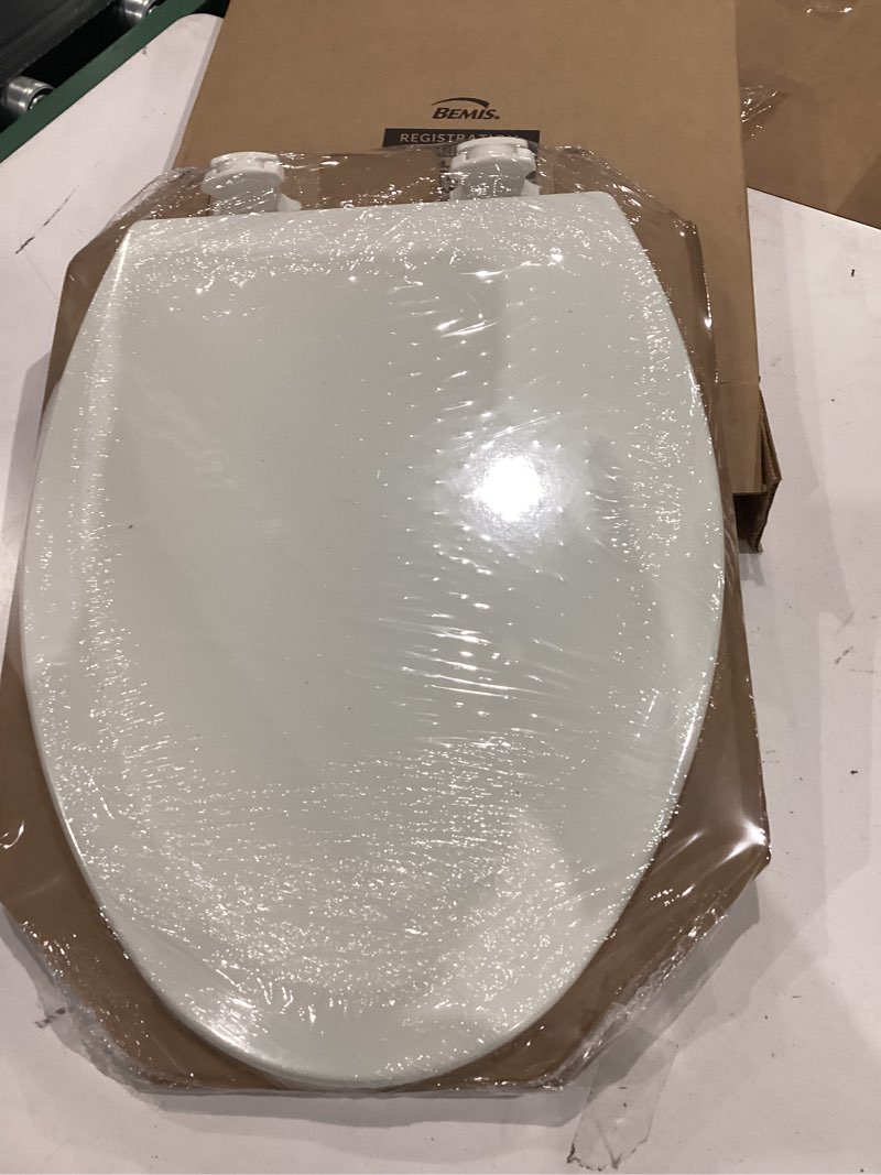 Condition photo showing Good Condition for bemis elongated enameled wood toilet seat in biscuit with easy•clean? hinge