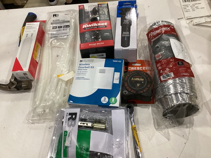 Condition photo showing As Is for assorted home improvement lot (small tools, screw, home accessories, etc.)