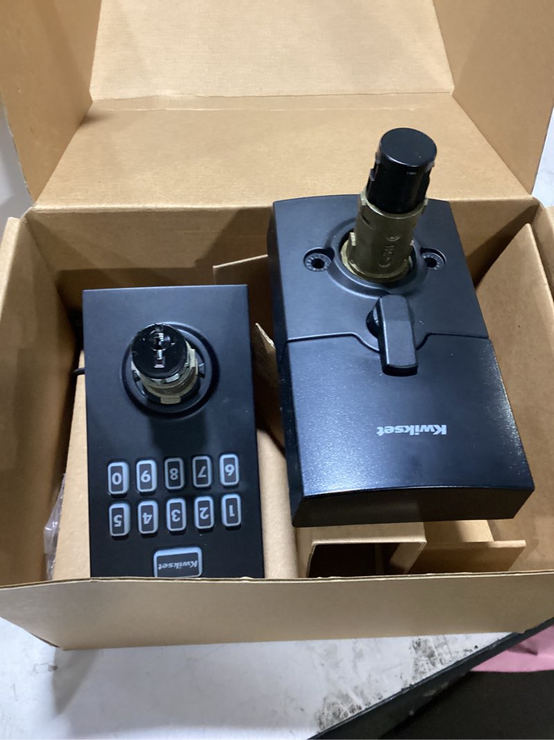 Condition photo showing As Is for kwikset smartkey iron black zinc electronic touch pad entry lever