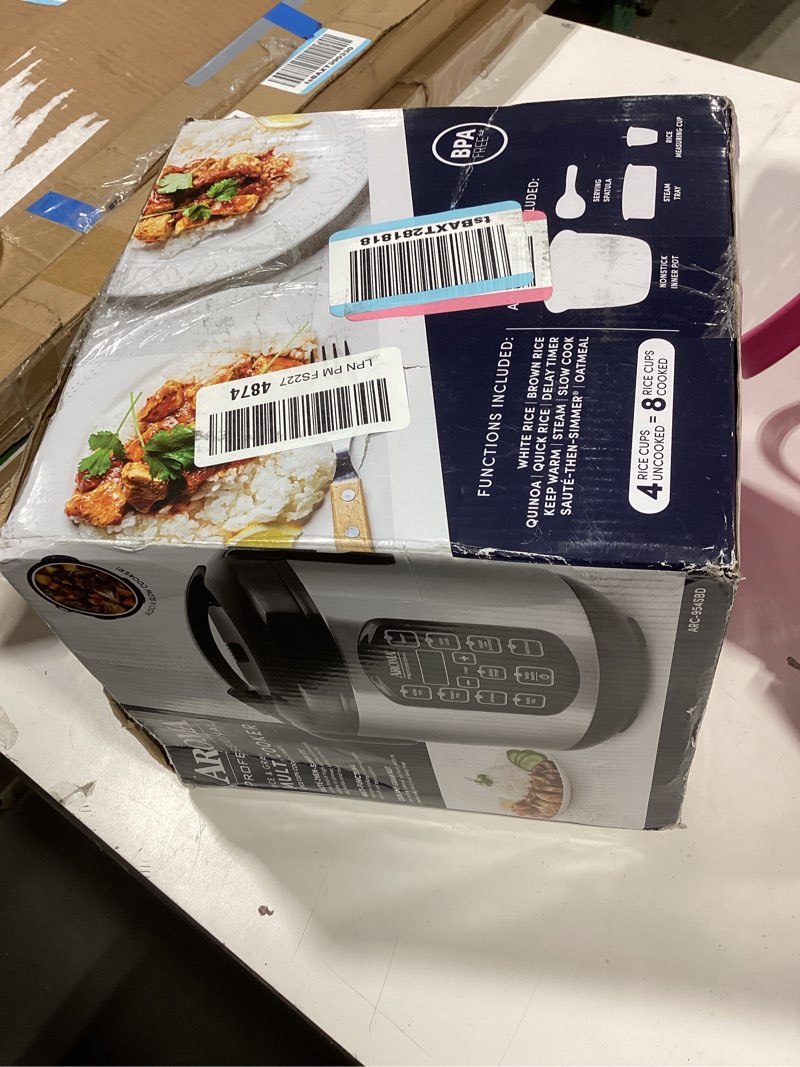 Condition photo showing As Is for aroma professional digital rice cooker, multicooker, 4-cup (uncooked) / 8-cup (cooked), steamer, slow cooker, oatmeal cooker, sts, auto keep warm, 2 qt, stainless steel exterior, arc-954sbd 4-cup uncooked rice