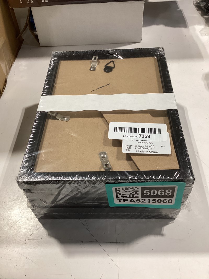 Condition photo showing Good Condition for fxojyvo a5 frame set of 6, display picture 4x6 with mat or without mat, light weight and high transparent photo 5.8x8.3 frame for wall - 6 pack/black 6 a5/a6