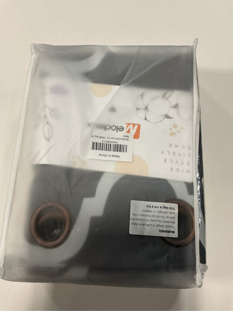 Condition photo showing New/Like New for Melodieux Moroccan Fashion Room Darkening Blackout Grommet Top Curtains, 100 by 96 Inch, Grey (1 Panel) Grey 100\\\"W x 96\\\"L (Pack of 1)