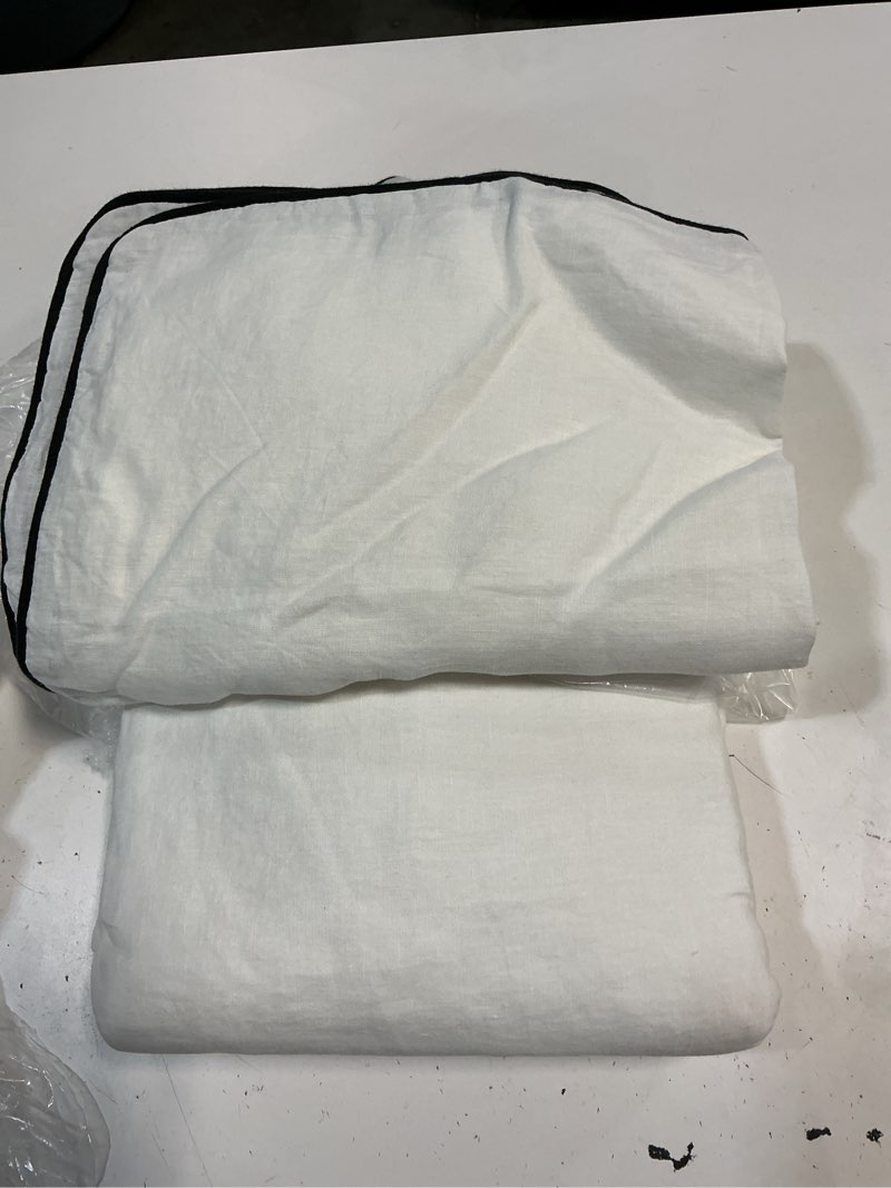 Condition photo showing As Is for european linen piped  cover set, full/queen, white/black