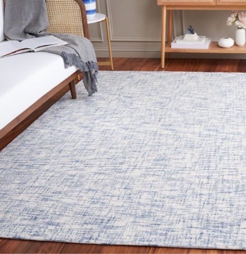  Similar  Unknown size SAFAVIEH Ebony Collection - Alfombra de área de azul y marfil, diseño moderno, lana hecha a mano, ideal para sala de estar, dormitorio, comedor