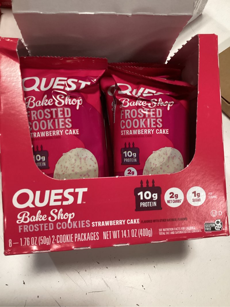 Condition photo showing New/Like New for bbd:05-18-2026) quest nutrition frosted cookies twin pack, strawberry cake, 1g sugar, 10g protein, 2g net carbs, gluten free, 16 cookies strawberry cake 16 count