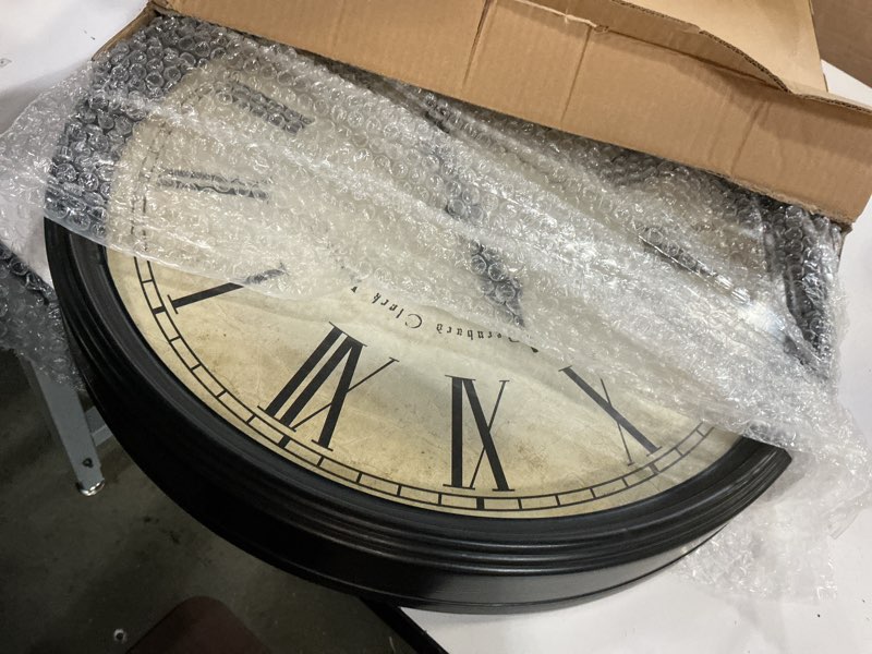 Condition photo showing Good Condition for Bernhard Products Large Decorative Wall Clock 20 Inch Silent Non Ticking Battery Operated Quartz Vintage Stylish with Rustic Black Rim for Home Living/Dining Room Kitchen & Over Fireplace