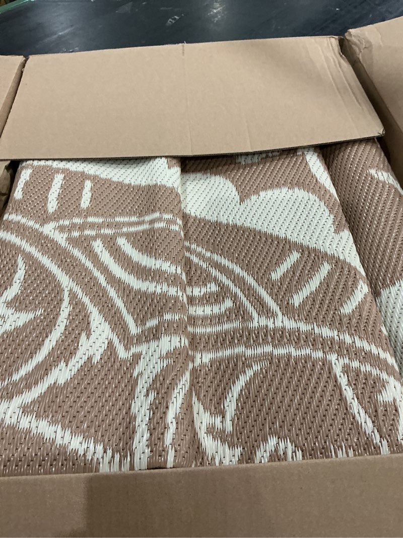 Condition photo showing Good Condition for pauwer waterproof outdoor rug 9x12, reversible plastic straw patio camping rug, indoor outdoor rv mat carpet for deck, camper, porch, balcony, backyard, picnic, paisley brown 9' x 12' (rectangular) paisley brown