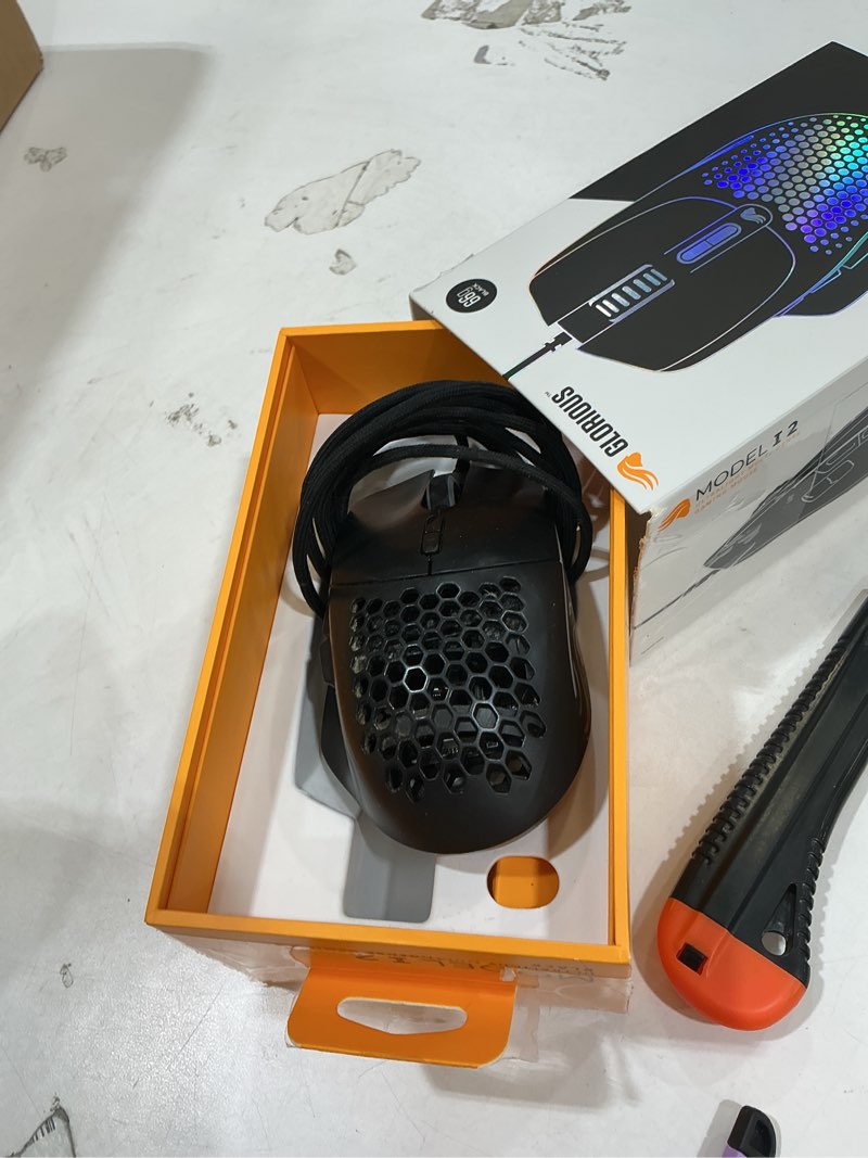 Condition photo showing As Is for glorious gaming model i 2 wired gaming mouse: 9 programmable buttons (2 swappable), 66g superlight, 26k optical sensor, 80m click rated switches, mmo/moba/fps, side thumb rest (black) model i2 wired matte black