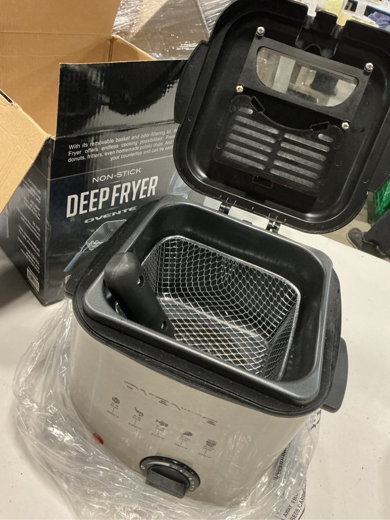 Condition photo showing As Is for ovente electric deep fryer, 1.5l capacity, 800w with adjustable temperature, viewing window lid, removable frying basket & cool-touch handles, stainless steel countertop fryer, silver fdm1501br fdm1501br - silver