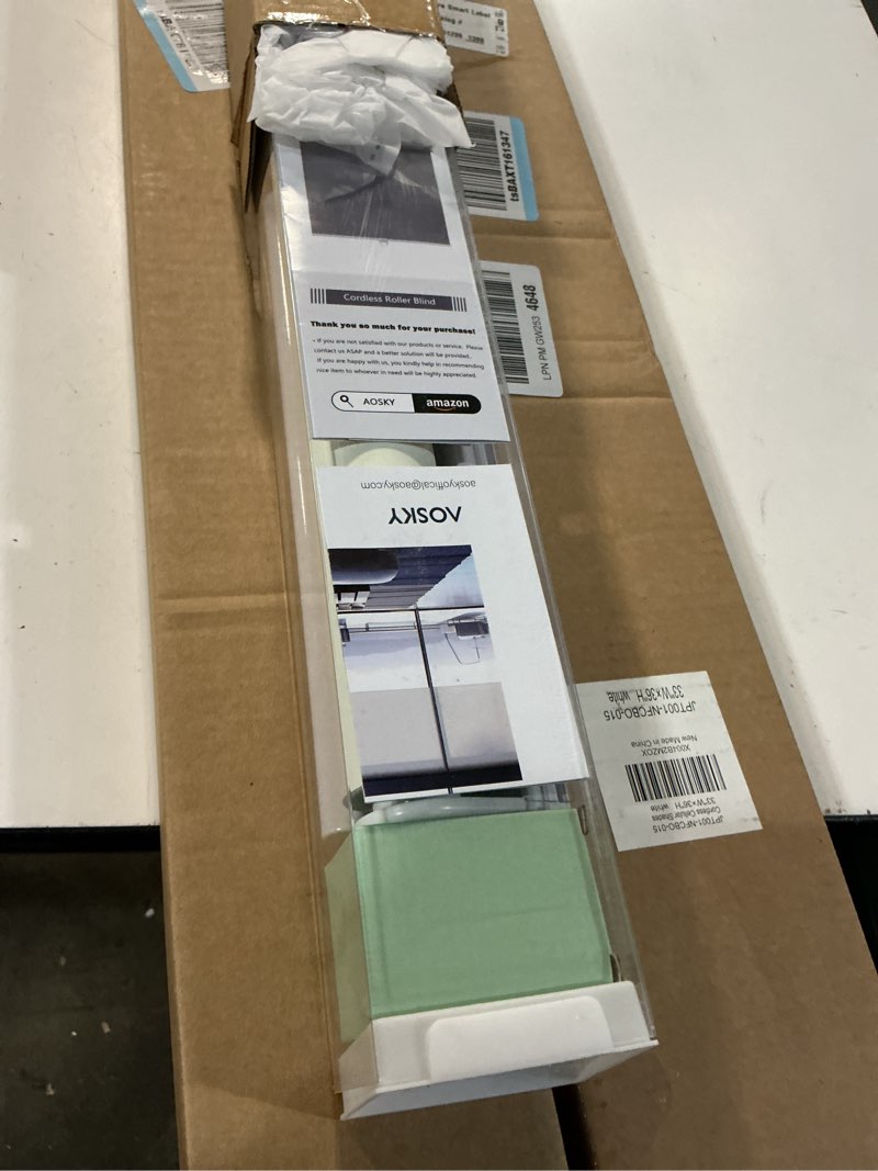 Condition photo showing New/Like New for aosky cordless roller shades blackout blinds for windows room darkening rolled up shades with spring system, uv protection window shades door blinds for home and office (25" w x 72" h, ivory) 25"w x 72"h ivory