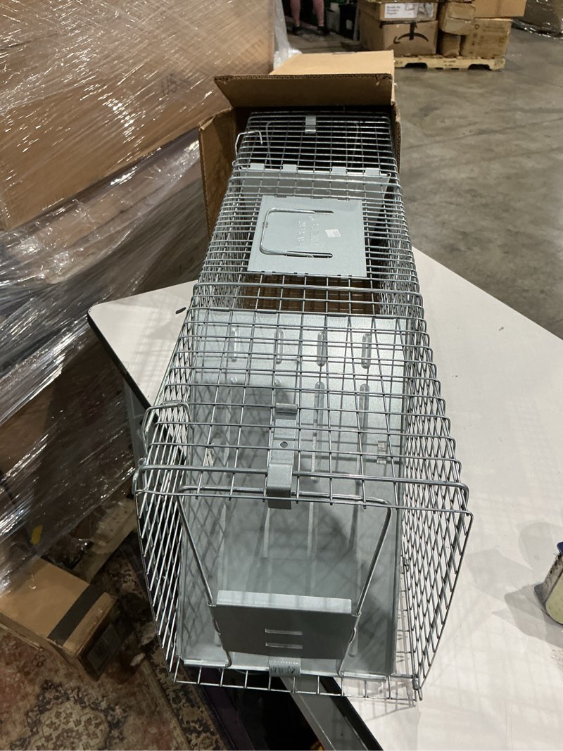 Condition photo showing Good Condition for havahart 1045sr large 2-door humane catch and release live animal trap for armadillos, beavers, bobcats, small dogs, cats, foxes, groundhogs, nutria, opossums, raccoons, and similar-sized animals