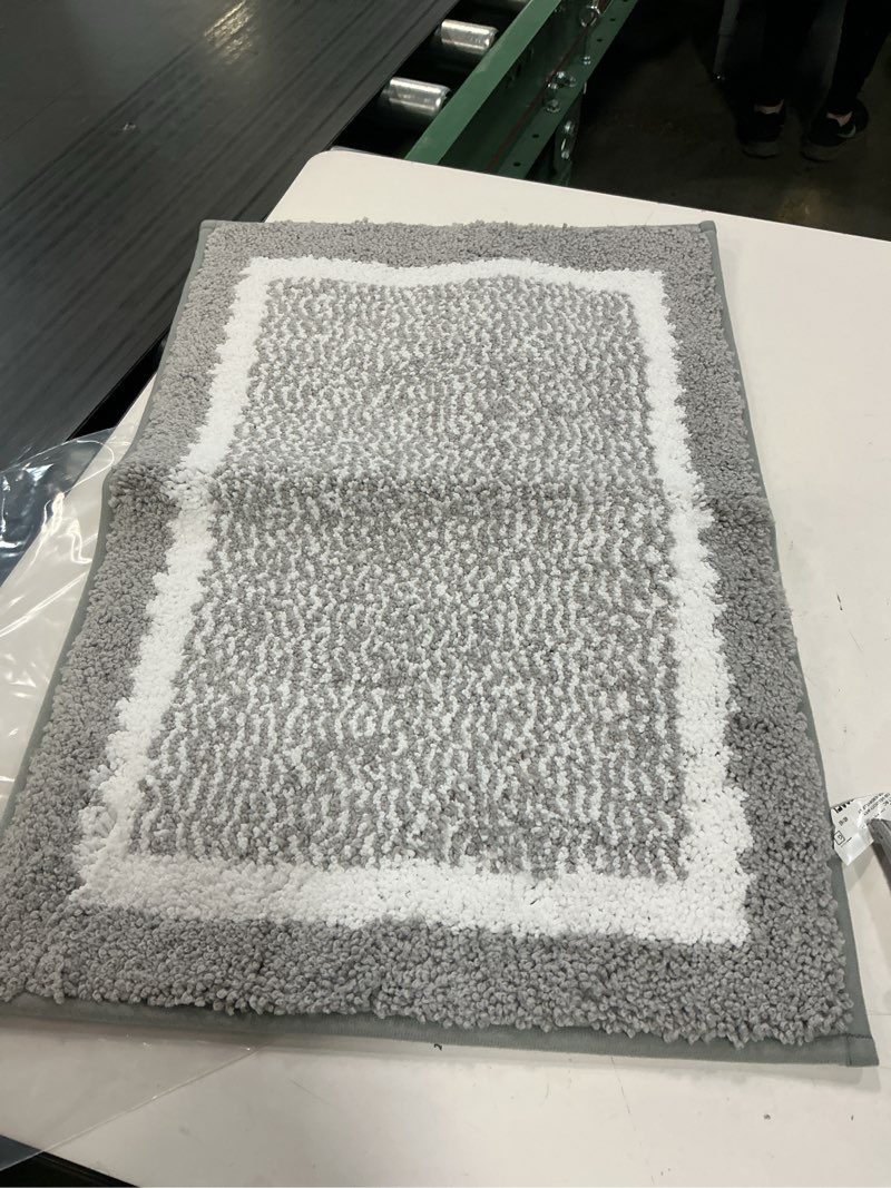 Condition photo showing As Is for pabube bathroom rug, soft absorbent bathroom mat and bath mat, premium microfiber shag bath rug machine washable (16"x24",grey and white)