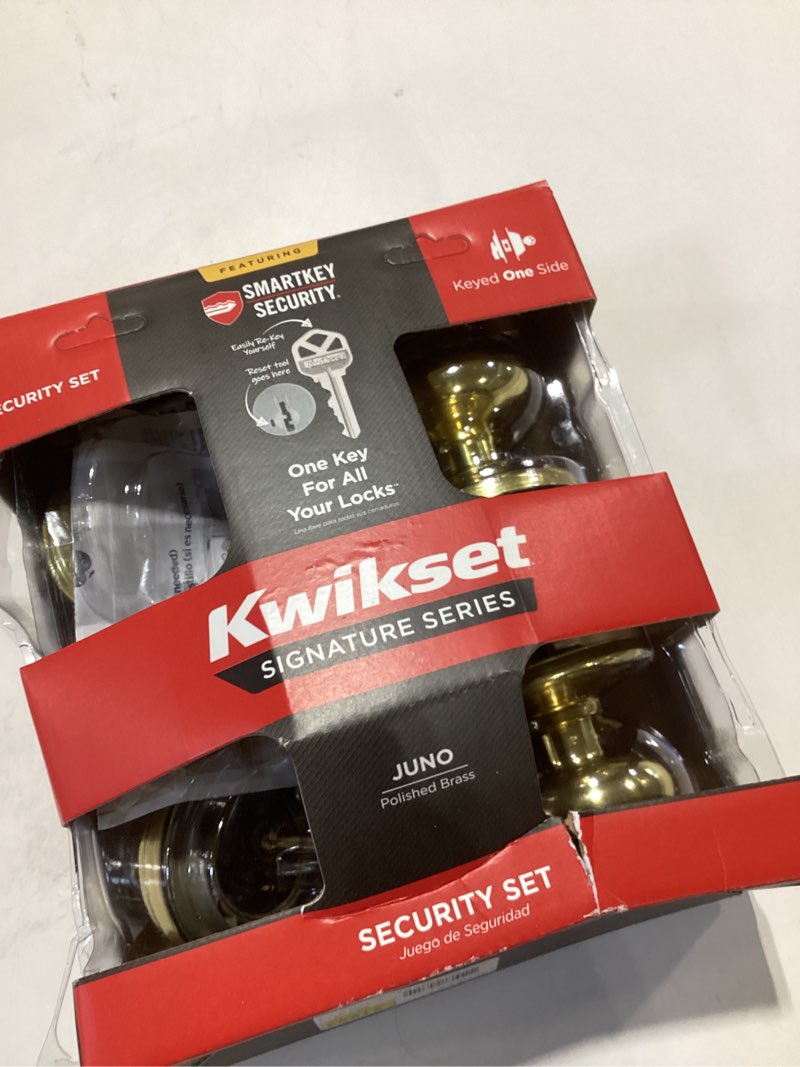 Condition photo showing As Is for Kwikset Juno Keyed Entry Door Knob and Single Cylinder Deadbolt Combo Pack with Microban Antimicrobial Protection featuring SmartKey Security in Polished Brass Polished Brass 1 Pack Combo Pack