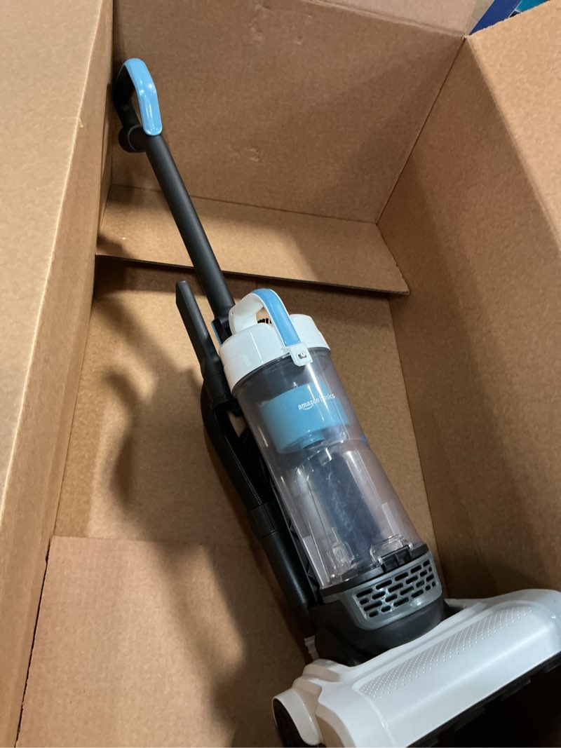 Condition photo showing As Is for amazon basics upright bagless vacuum cleaner for carpet and hard floors, washable filter, crevice and upholstery tools, detachable handle, lightweight, 1.7l dust cup, 25ft cord, black/white